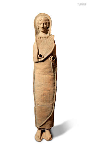 A large Etruscan terracotta votive statue of a female worshipper