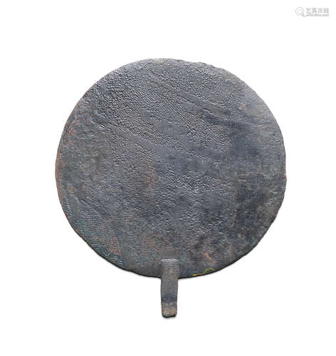 An Egyptian bronze mirror