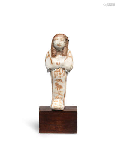 An Egyptian white glazed composition shabti for Pa-Iry