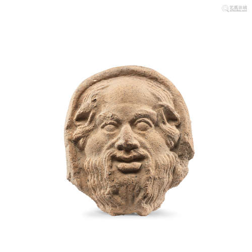 An Etruscan terracotta antefix of Silenus