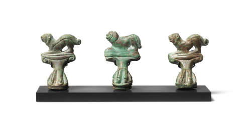 Three Etruscan bronze cista feet  3