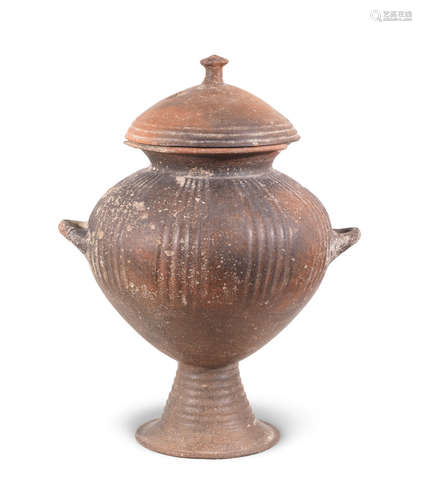 A Villanovan impasto ware lidded olla