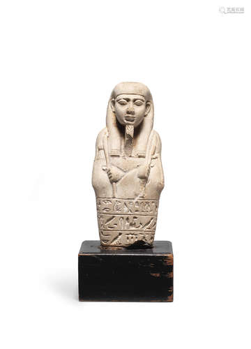 An Egyptian glazed composition fragmentary shabti for Horsiaset