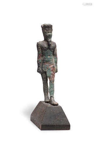 A large Egyptian bronze figure of Amun