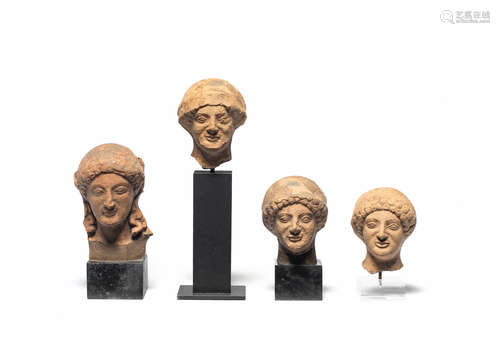 Four Greek terracotta male heads  4