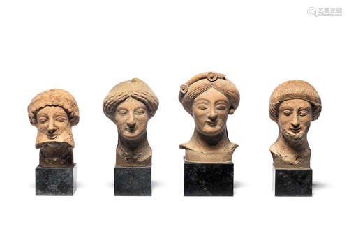 Four Greek terracotta heads   4