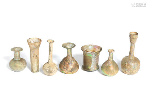 A group of six Roman green glass vessels