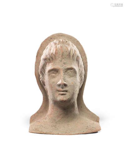 An Etruscan terracotta votive head