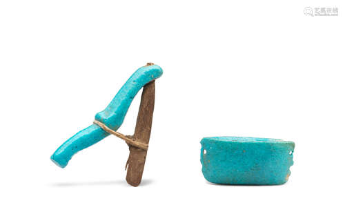 Two Egyptian glazed composition models of a hoe and a seed basket  2