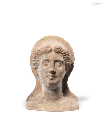 An Etruscan terracotta votive head