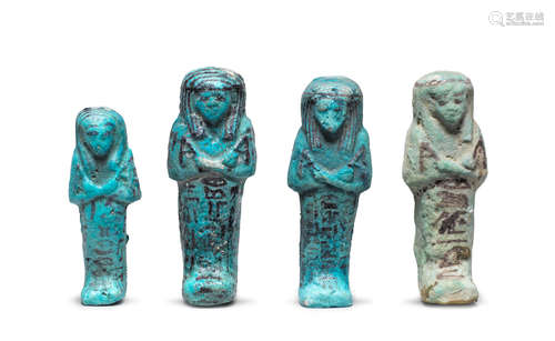 Four Egyptian turquoise glazed composition shabtis