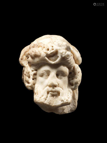 A Roman marble herm head of Dionysus