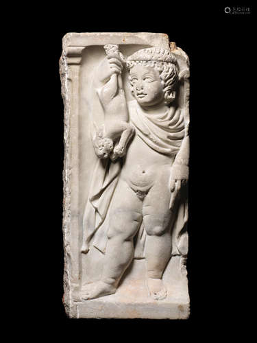 A Roman marble sarcophagus fragment representing Autumn