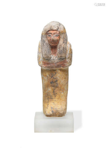 An Egyptian limestone polychrome painted shabti for Tawert