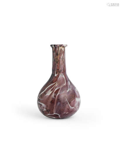 A Roman aubergine and white marbled glass flask