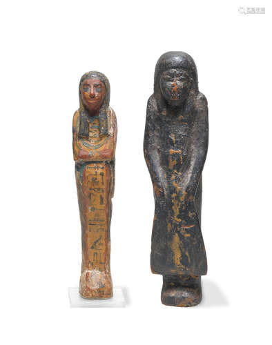 An Egyptian polychrome painted wood shabti and an Egyptian wood funerary statuette  2