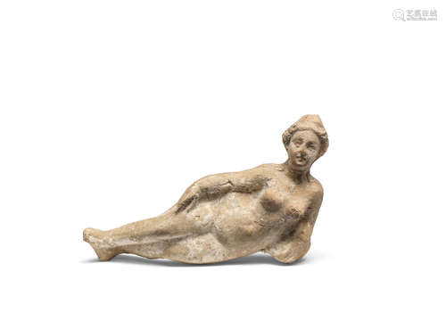 A Roman terracotta figure of a reclining nude female and a Roman terracotta Venus  2