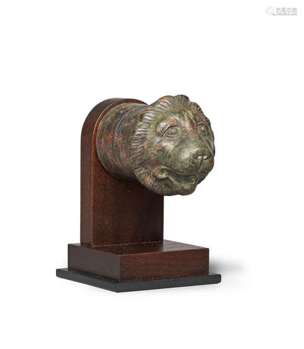 A Roman bronze lion face protome