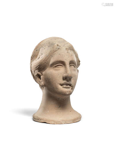 An Etruscan votive female head