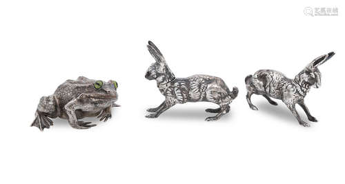 peppers town mark lacking, probably London 1905   (3) A pair of early 20th century silver hare peppers and a silver frog paperweight