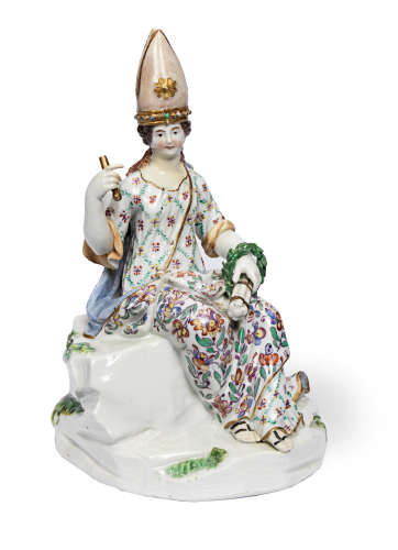 Circa 1770 An Academic Meissen figure of a seated lady wearing a mitre hat