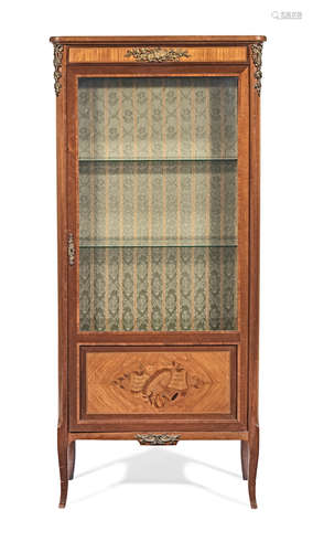 In the Louis XVI style A French early 20th century kingwood, mahogany, marquetry and gilt metal mounted vitrine