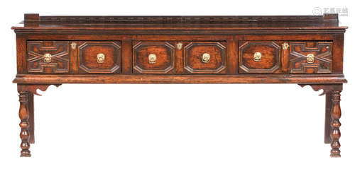 A 17th century oak dresser base