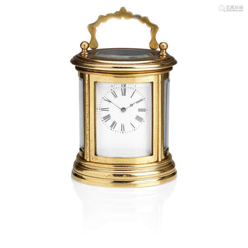 An early 20th century brass oval carriage clock