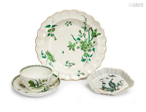 Circa 1765 A Worcester plate, teacup and saucer and a Chinese spoon tray