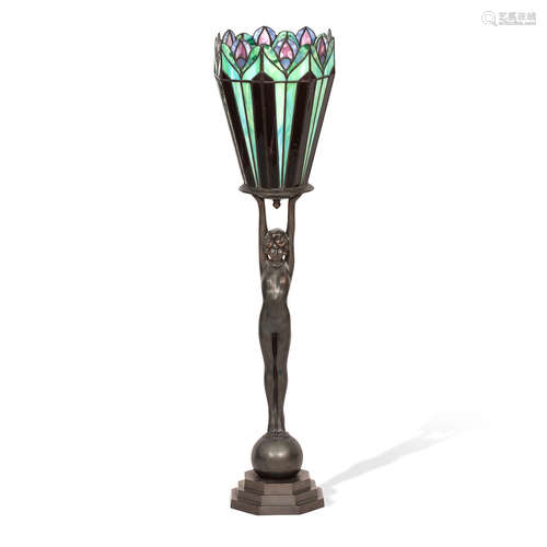 An Art Deco style bronzed figural lamp