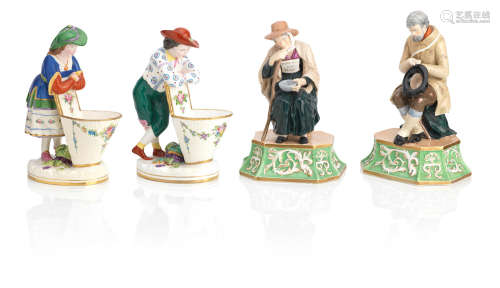 Late 19th/early 20th Century A pair of English porcelain figures of beggars, a pair of Minton figural sweetmeats and a pair of Coalport plates