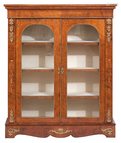 A 19th century walnut marquetry and gilt metal mounted bookcase