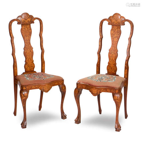 A pair of 19th century rosewood and satinwood marquetry inlaid chairs