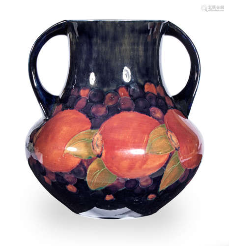 A William Moorcroft Pomegranate twin-handled vase