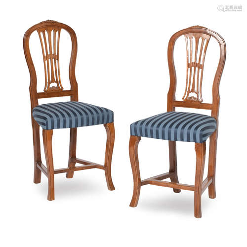 A set of four walnut dining chairs, 20th century