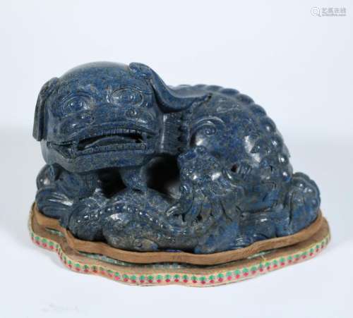 A Carved Lapis Lazuli Foo Dog With Young