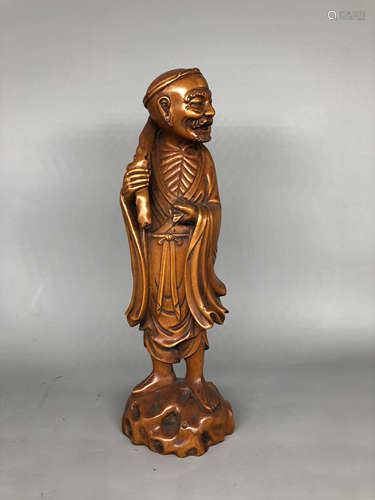 A Chinese Carved Huangyang Figure