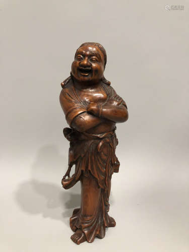 A Chinese Carved Huangyang Figure of Liuhai