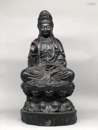 A Chinese Carved Heitan Buddha