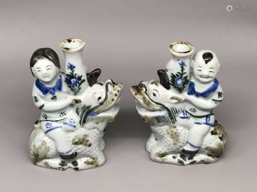A Pair of Chinese Famille-Rose Porcelain Kids