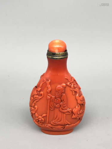 A Chinese Carved Red Stone Snuff Bottle