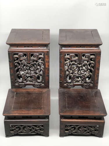 A Pair of Chinese Carved Hardwood Stands