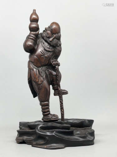 A Chinese Carved Rosewood Figure