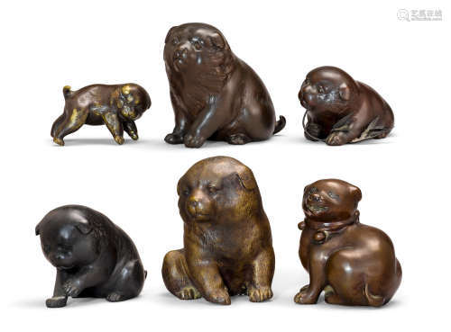 A group of six bronze puppies, okimono  19th/20th century