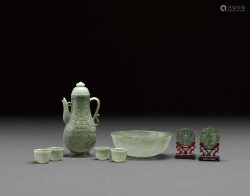 A group of eight spinach jade carvings   20th century