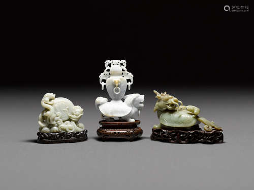 A group of three carved hardstone mythical beasts  20th century