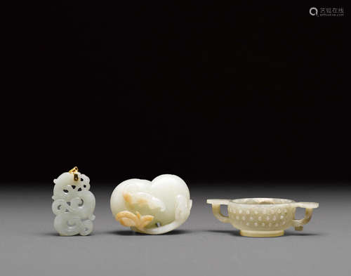 A group of three small jade decorations