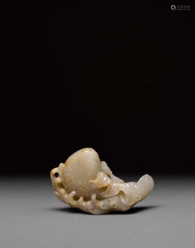 A pale greenish-white jade carving of a carp