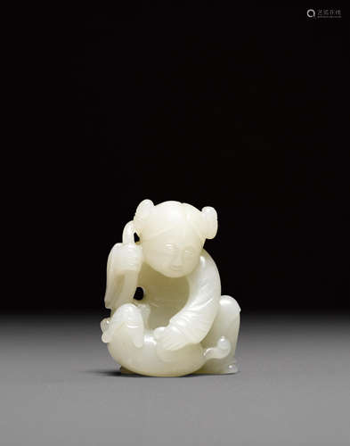 A carved jade boy