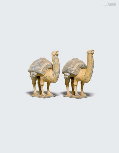 A pair of Six Dynasties style painted pottery camels